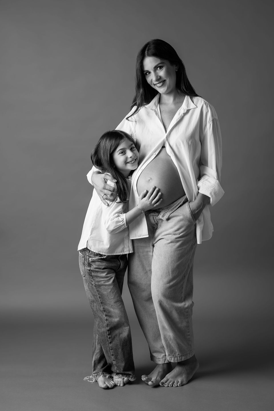 Genitori e figlio in bianco e nero, ritratto in studio